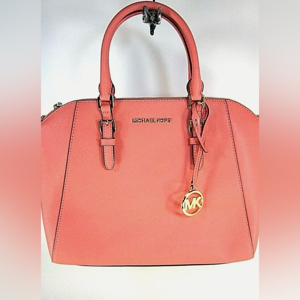 Large dome Michael Kors purse w/ convertible crossbody strap. Pink/orange Coral
